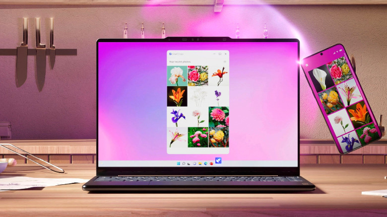 휴대폰 화면을 미러링하는 주방 카운터 위에 있는 Yoga 9i 2-in-1 Aura Edition.